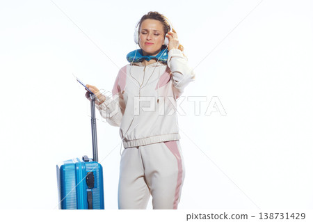 Relaxed Traveler Looking at Boarding Pass 138731429
