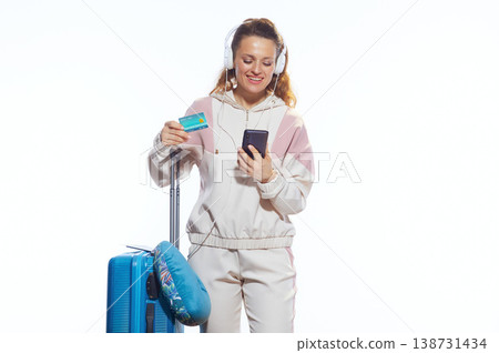 Woman Traveler Using Smartphone and Credit Card for Booking Woman Traveler Using Smartphone and Credit Card for Booking 138731434