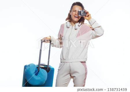 Stylish Traveler Capturing Memories with Vintage Camera Stylish Traveler Capturing Memories with Vintage Camera 138731439