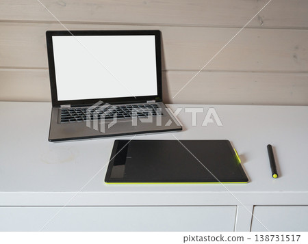 Laptop and graphic tablet workspace setup Laptop and graphic tablet workspace setup 138731517