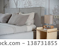 Modern bedroom interior with wooden nightstand and gray pillows 138731855