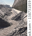 Narrow pathway through deep snow in city 138731859
