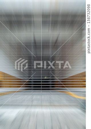 Motion blurred photo of a closed entrance to underground garage, abstract background. Motion blurred photo of a closed entrance to underground garage, abstract background. 138732098