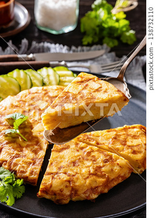 Spanish potato omelette, tortilla on a plate Spanish potato omelette, tortilla on a plate 138732110