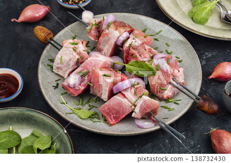 Fresh pork meat skewers ready for BBQ cooking Fresh pork meat skewers ready for BBQ cooking 138732430