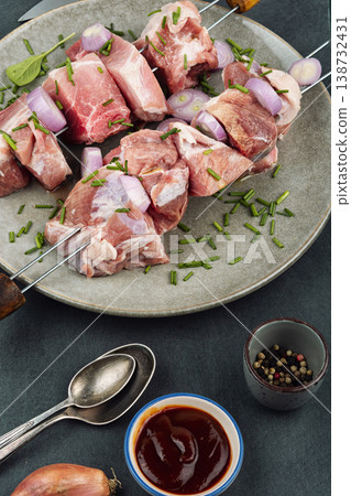 Traditional pork shashlik skewers with onion and herbs Traditional pork shashlik skewers with onion and herbs 138732431