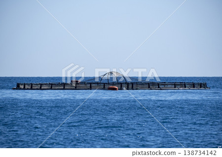 Offshore Fish Farm in the Open Sea. Sustainable Fish Farming in the Middle of the Sea. Offshore Fish Farm in the Open Sea. Sustainable Fish Farming in the Middle of the Sea. 138734142