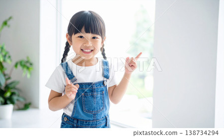 A girl playing indoors A girl playing indoors 138734294