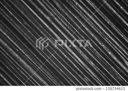 Closeup lines texture stripes wooden dark grunge surface wood background board pattern plank black Closeup lines texture stripes wooden dark grunge surface wood background board pattern plank black 138734623