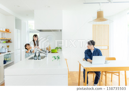 Young families working remotely Young families working remotely 138735503