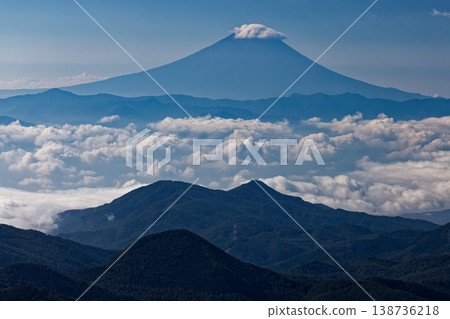 Mount Fuji above the clouds as seen from Mt. Asahi in Okuchichibu Mount Fuji above the clouds as seen from Mt. Asahi in Okuchichibu 138736218