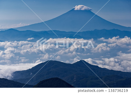 Mount Fuji above the clouds as seen from Mt. Asahi in Okuchichibu Mount Fuji above the clouds as seen from Mt. Asahi in Okuchichibu 138736219