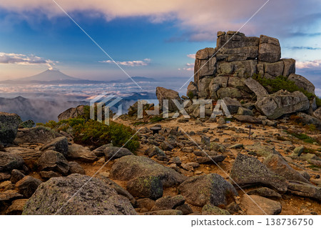 The Gojo-ishi rock formation and Mount Fuji at the summit of Mt. Kinpu in Okuchichibu in the morning. The Gojo-ishi rock formation and Mount Fuji at the summit of Mt. Kinpu in Okuchichibu in the morning. 138736750