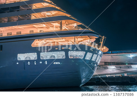 A fantastical night view of a luxury cruise ship docked at Yokohama's Osanbashi Pier. A fantastical night view of a luxury cruise ship docked at Yokohama's Osanbashi Pier. 138737086