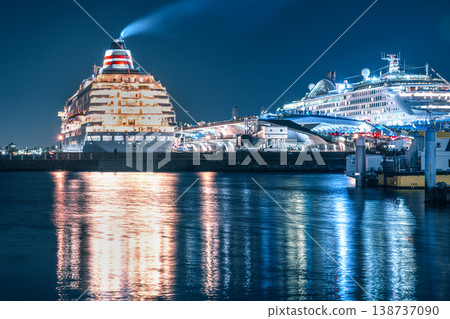 A fantastical night view of a luxury cruise ship docked at Yokohama's Osanbashi Pier. A fantastical night view of a luxury cruise ship docked at Yokohama's Osanbashi Pier. 138737090