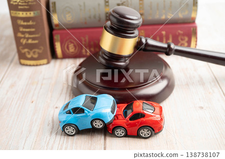 Bangkok, Thailand March 15, 2024 Car accident lawsuit and insurance, Judge hammer and money with car model. Bangkok, Thailand March 15, 2024 Car accident lawsuit and insurance, Judge hammer and money with car model. 138738107