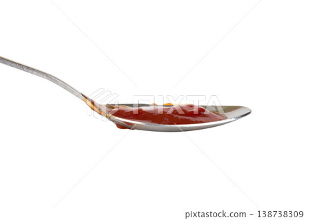 A spoon and ketchup. isolated on white background 138738309