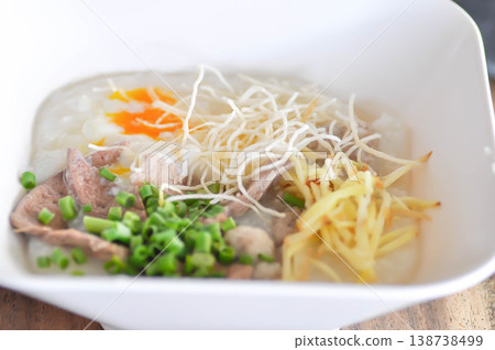 rice gruel or rice porridge or congee with pork ball, pork liver and egg or pork congee rice gruel or rice porridge or congee with pork ball, pork liver and egg or pork congee 138738499