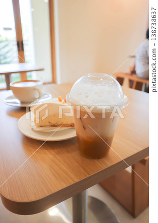 coffee , iced coffee or iced cappuccino coffee and cake 138738637