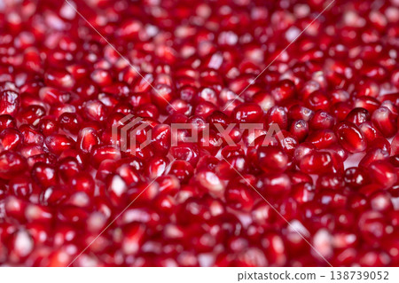 Bright pomegranate seeds dense abstract pattern repeating glossy arils filling frame, macro texture study, vibrant red palette, minimal composition, artistic background Bright pomegranate seeds dense abstract pattern repeating glossy arils filling frame, macro texture study, vibrant red palette, minimal composition, artistic background 138739052