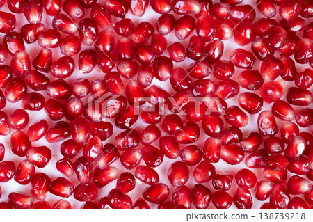 Brightly arranged ripe seeds. Colorful presentation of ripe seeds intricately displayed. Lively and detailed show of mature pomegranate seeds attractively arranged Brightly arranged ripe seeds. Colorful presentation of ripe seeds intricately displayed. Lively and detailed show of mature pomegranate seeds attractively arranged 138739218
