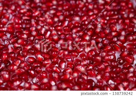 Luminous pomegranate seeds captured beautifully. Elegant image showcasing natural seed extracts for skincare. Serene visual emphasizing nutrientrich arils for beauty products Luminous pomegranate seeds captured beautifully. Elegant image showcasing natural seed extracts for skincare. Serene visual emphasizing nutrientrich arils for beauty products 138739242