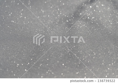 Snow sparkle details. Highresolution study of shimmering snow crystals under sunlight. Intensive examination of granular snow textures with shimmering icy reflections and cold glow 138739322