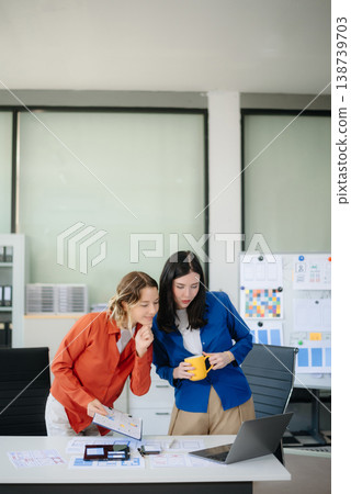 Woman people meeting team brainstorming on their project with laptop, smartphone and digital tablet. Woman people meeting team brainstorming on their project with laptop, smartphone and digital tablet. 138739703