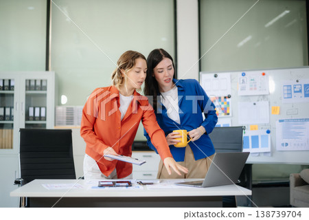 Woman people meeting team brainstorming on their project with laptop, smartphone and digital tablet. 138739704