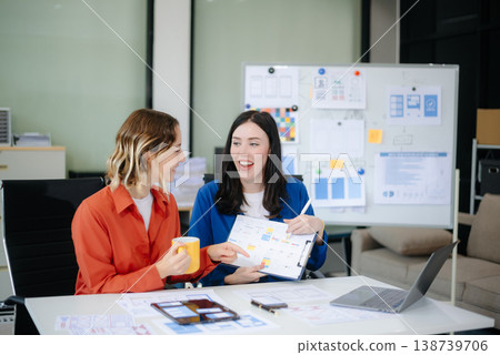Woman people meeting team brainstorming on their project with laptop, smartphone and digital tablet. Woman people meeting team brainstorming on their project with laptop, smartphone and digital tablet. 138739706