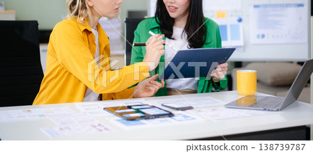 Woman people meeting team brainstorming on their project with laptop, smartphone and digital tablet. Woman people meeting team brainstorming on their project with laptop, smartphone and digital tablet. 138739787