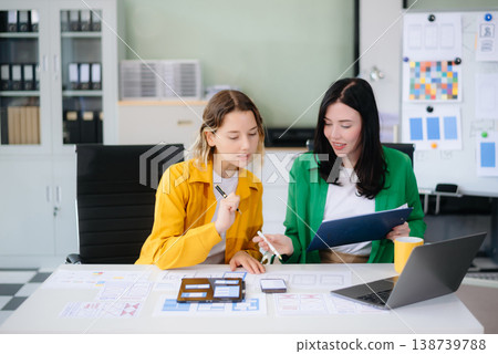 Woman people meeting team brainstorming on their project with laptop, smartphone and digital tablet. Woman people meeting team brainstorming on their project with laptop, smartphone and digital tablet. 138739788