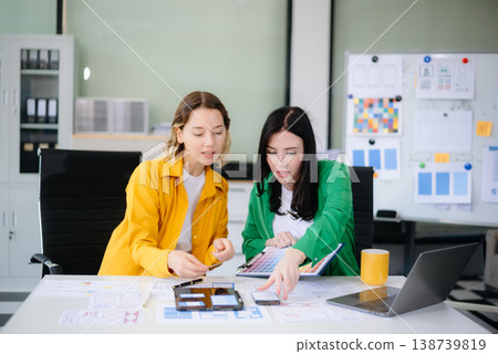 Business colleague business presents and explains and using laptop and tablet. Teamwork, financial 138739819