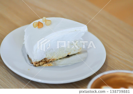 coconut tart or coconut cake or sponge cakeor coconut tart with macadamia 138739881