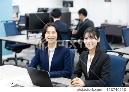 Female manager and young employee Female manager and young employee 138740338