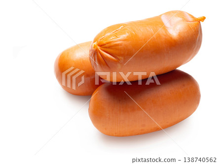 Appetizing sausages close-up on a white isolated background Appetizing sausages close-up on a white isolated background 138740562