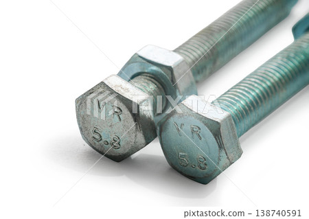 construction bolts close-up on a white isolated background construction bolts close-up on a white isolated background 138740591