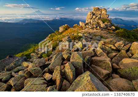 The Gojo-ishi rock formation and Mount Fuji at the summit of Mt. Kinpu in Okuchichibu in the morning. The Gojo-ishi rock formation and Mount Fuji at the summit of Mt. Kinpu in Okuchichibu in the morning. 138740670
