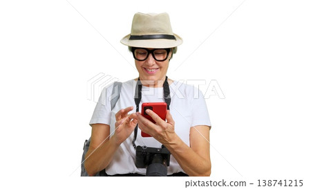 Woman traveler using smartphone for navigation on isolated background 138741215