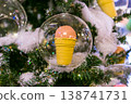 A Festive Touch: Ice Cream Cone Ornament on Christmas Tree 138741731