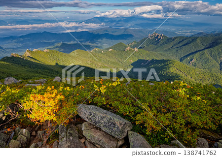 The ridgeline towards Mt. Mizugaki as seen from the summit of Mt. Kinpu in early autumn. The ridgeline towards Mt. Mizugaki as seen from the summit of Mt. Kinpu in early autumn. 138741762