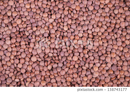 Visual focus on textured lentil seeds for nutrition promotion. Highresolution image highlighting fortified lentil seed structure for dietary and marketing purposes 138743177