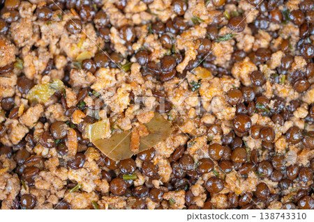 Proteinrich lentil mixture. Nourishing lentils combined with minced meat and seasonings. Flavorful and nutritious lentil and minced meat blend ideal for healthy meal preparation Proteinrich lentil mixture. Nourishing lentils combined with minced meat and seasonings. Flavorful and nutritious lentil and minced meat blend ideal for healthy meal preparation 138743310