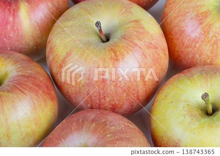 Vibrant fruit illustrating health. Juicy green and red apples emphasizing nutrition. Brightly colored apples emphasizing natural wellness benefits and nourishing qualities Vibrant fruit illustrating health. Juicy green and red apples emphasizing nutrition. Brightly colored apples emphasizing natural wellness benefits and nourishing qualities 138743365