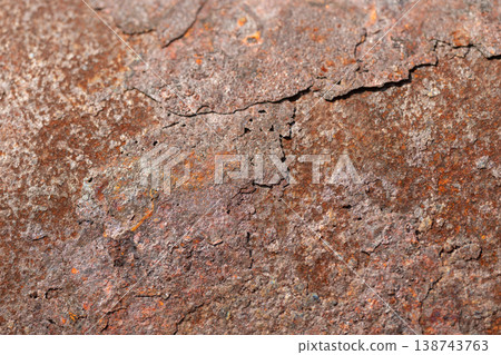 Macro rust on metal crack revealing layered flake and rough oxidation, deep fissure and varied tones create dramatic textured closeup for repair and decay narratives Macro rust on metal crack revealing layered flake and rough oxidation, deep fissure and varied tones create dramatic textured closeup for repair and decay narratives 138743763