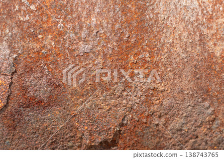 Corroded metallic sheet showcasing gritted industrial appearance and patina. Degraded rusted metal platform featuring coarse texture and weathered utilitarian aesthetic Corroded metallic sheet showcasing gritted industrial appearance and patina. Degraded rusted metal platform featuring coarse texture and weathered utilitarian aesthetic 138743765