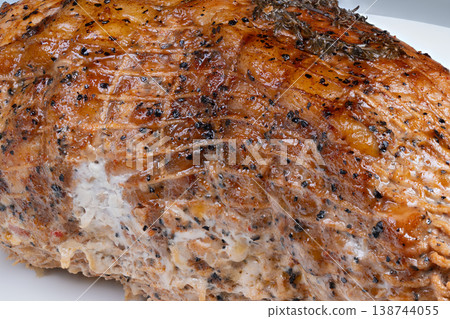 Flavorful crispy pork. Savory roasted pork with herbs. Juicy seasoned pork with golden crunchy crust. Tender roasted pork with caramelized spice crust and netting marks Flavorful crispy pork. Savory roasted pork with herbs. Juicy seasoned pork with golden crunchy crust. Tender roasted pork with caramelized spice crust and netting marks 138744055