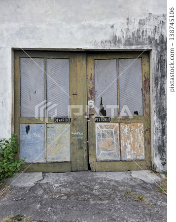 Vintage Moody Image of Old Distressed Wooden Garage Doors Vintage Moody Image of Old Distressed Wooden Garage Doors 138745106