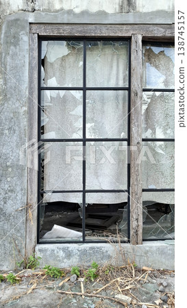 Abandoned Industrial Minimalist Scene with Broken Windows and Debris Abandoned Industrial Minimalist Scene with Broken Windows and Debris 138745157