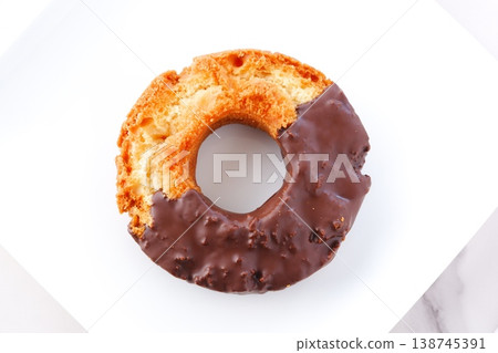Donuts and Coffee - Chocolate-covered old-fashioned donuts and coffee Donuts and Coffee - Chocolate-covered old-fashioned donuts and coffee 138745391